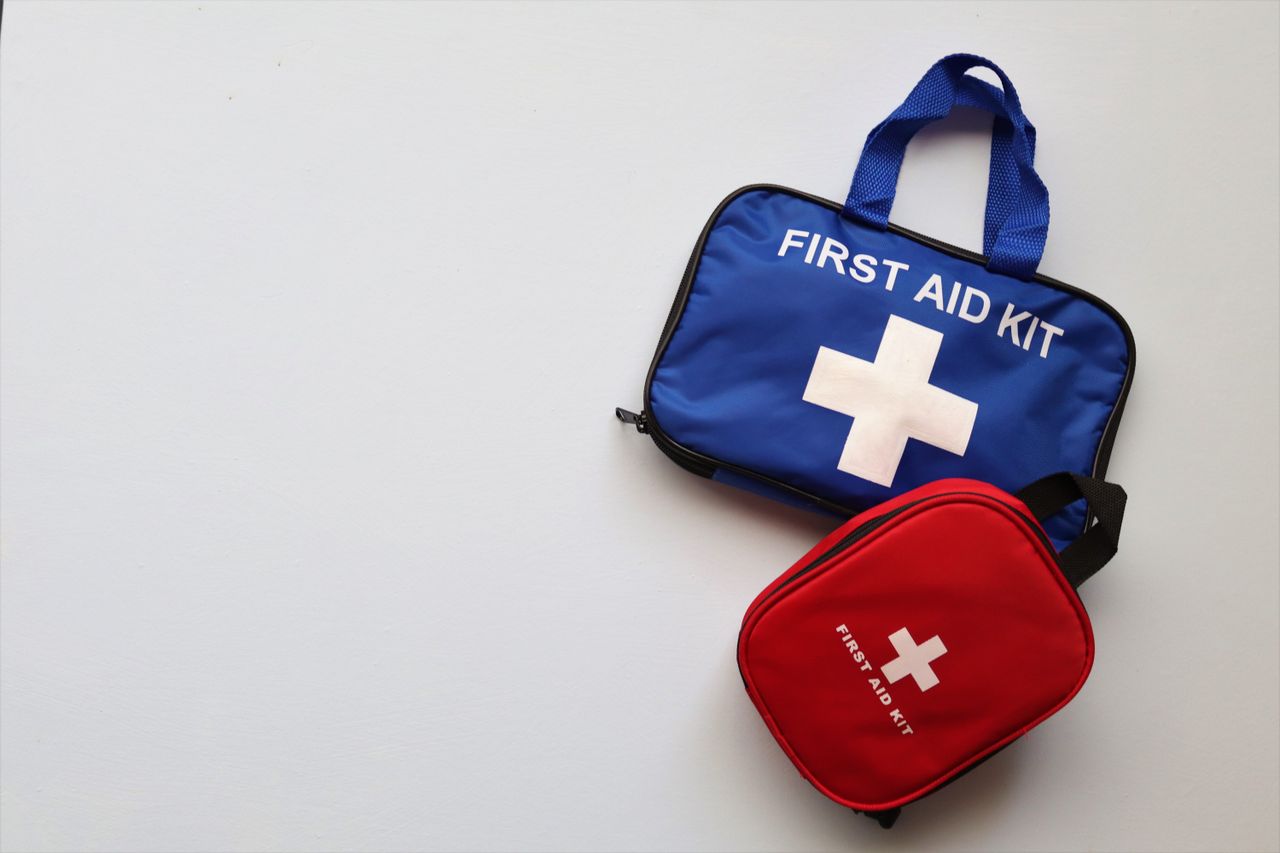 Home Two first aid kits on a white background with ample copy space.